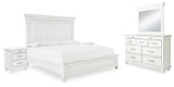 Kanwyn Queen Panel Bed with Mirrored Dresser and 2 Nightstands in Whitewash from Ashley - Luna Furniture