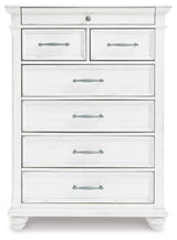 Kanwyn King Panel Bed with Mirrored Dresser, Chest and 2 Nightstands in Whitewash from Ashley - Luna Furniture