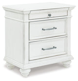 Kanwyn King Panel Bed with Mirrored Dresser, Chest and 2 Nightstands in Whitewash from Ashley Furniture - Luna Furniture