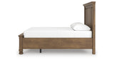 Feddinger Medium Brown Queen Panel Storage Bed from Ashley - Luna Furniture