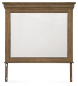 Karallin Medium Brown Bedroom Mirror from Ashley Furniture - Luna Furniture