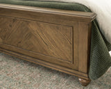 Karallin Medium Brown California King Panel Bed from Ashley - Luna Furniture