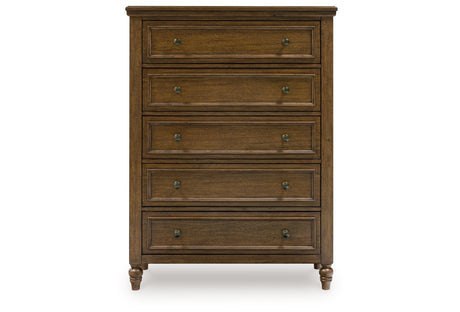 Sturlayne California King Upholstered Panel Bed with Mirrored Dresser, Chest and 2 Nightstands in Brown from Ashley - Luna Furniture