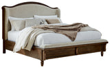 Sturlayne Brown Queen Upholstered Panel Bed with Footboard Bench from Ashley Furniture - Luna Furniture