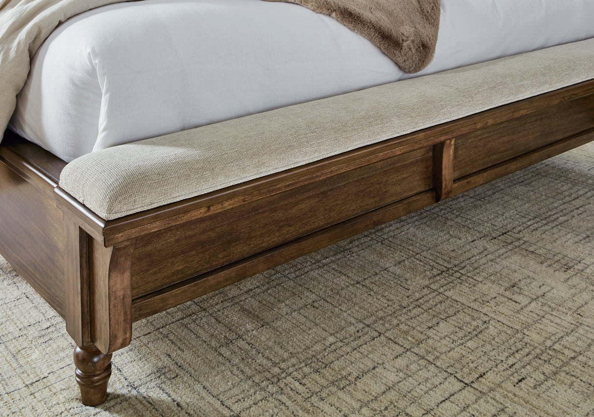 Sturlayne Brown California King Upholstered Panel Bed with Footboard Bench from Ashley Furniture - Luna Furniture