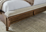 Sturlayne Brown Queen Upholstered Panel Bed with Footboard Bench from Ashley Furniture - Luna Furniture
