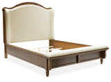 Sturlayne Brown Queen Upholstered Panel Bed with Footboard Bench from Ashley Furniture - Luna Furniture