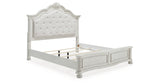 Montelaine Antique White King Upholstered Panel Bed from Ashley - Luna Furniture