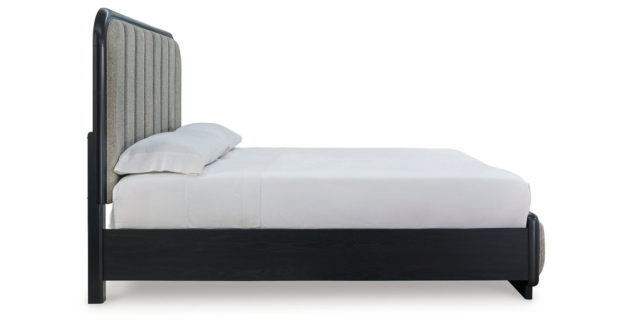 Rowanbeck King Upholstered Panel Bed with Mirrored Dresser, Chest and Nightstand in Gray/Black from Ashley Furniture - Luna Furniture