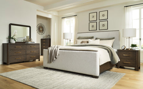 Radkin Burnished Brown Uphostered Panel Bedroom Set from Ashley - Luna Furniture