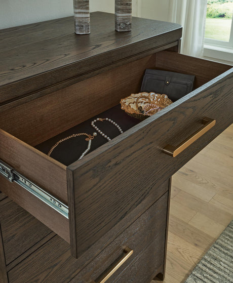 Radkin Burnished Brown Chest of Drawers from Ashley - Luna Furniture