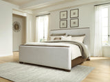 Radkin Burnished Brown California King Uphostered Panel Bed from Ashley - Luna Furniture