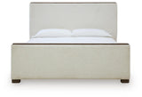 Radkin Burnished Brown Queen Uphostered Panel Bed from Ashley - Luna Furniture