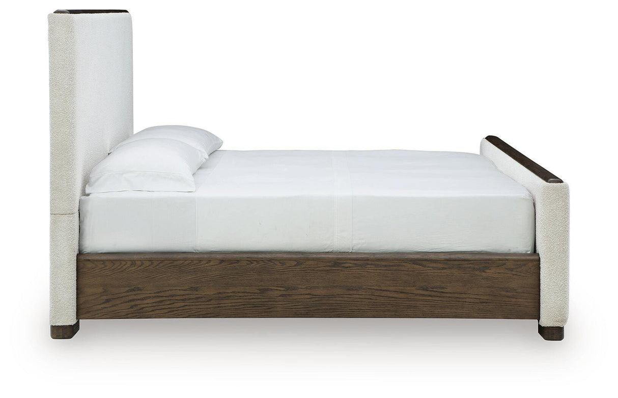 Radkin Burnished Brown King Uphostered Panel Bed from Ashley - Luna Furniture