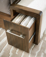 Marxmore Brown King Upholstered Storage Bed from Ashley - Luna Furniture