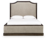Wickenger Dark Brown Queen Upholstered Panel Bed from Ashley - Luna Furniture
