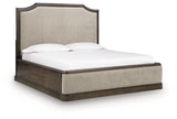 Wickenger Dark Brown King Upholstered Panel Bed from Ashley - Luna Furniture