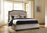 Wickenger Dark Brown California King Upholstered Panel Bed from Ashley - Luna Furniture