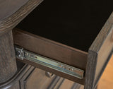 Wickenger Dark Brown Chest of Drawers from Ashley - Luna Furniture