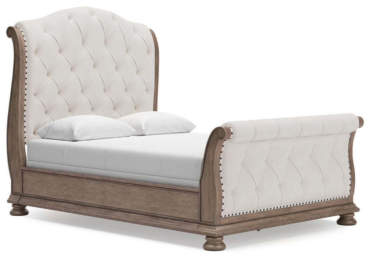 Ardenfield Light Brown Queen Upholstered Sleigh Bed from Ashley Furniture - Luna Furniture