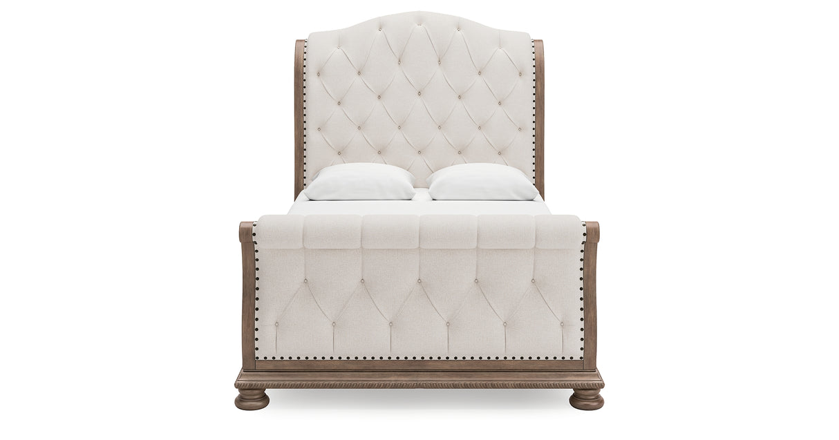 Ardenfield Queen Upholstered Sleigh Bed with Mirrored Dresser in Light Brown from Ashley Furniture - Luna Furniture