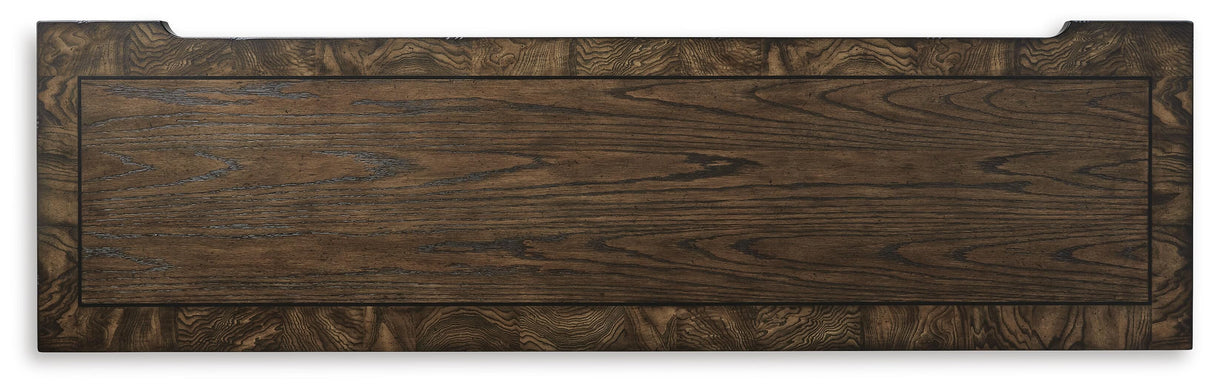 Maylee Dark Brown King Upholstered Panel Bed and Dresser