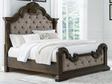 Maylee Dark Brown California King Upholstered Panel Bed from Ashley Furniture - Luna Furniture