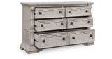 Bruchandi California King Upholstered Panel Bed with Dresser and Chest in Antique White from Ashley Furniture - Luna Furniture