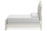 Arlendyne Antique White Queen Upholstered Panel Bed from Ashley - Luna Furniture