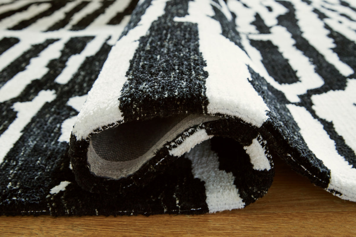 Bramshaw Black/Ivory Extra Large Rug from Ashley Furniture - Luna Furniture