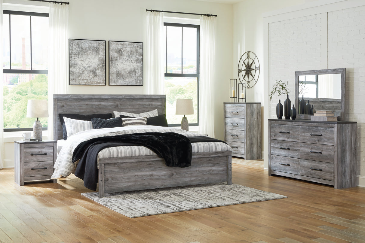 Bronyan King Panel Bed with Mirrored Dresser, Chest and 2 Nightstands in Dark Gray from Ashley Furniture - Luna Furniture