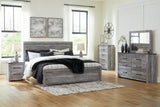 Bronyan King Panel Bed with Mirrored Dresser, Chest and 2 Nightstands in Dark Gray from Ashley Furniture - Luna Furniture