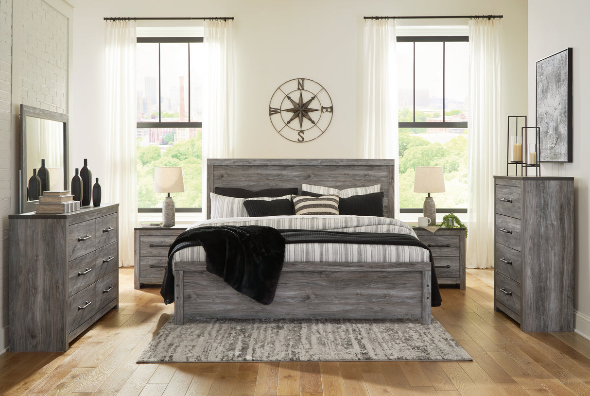 Bronyan King Panel Bed with Mirrored Dresser, Chest and 2 Nightstands in Dark Gray from Ashley Furniture - Luna Furniture
