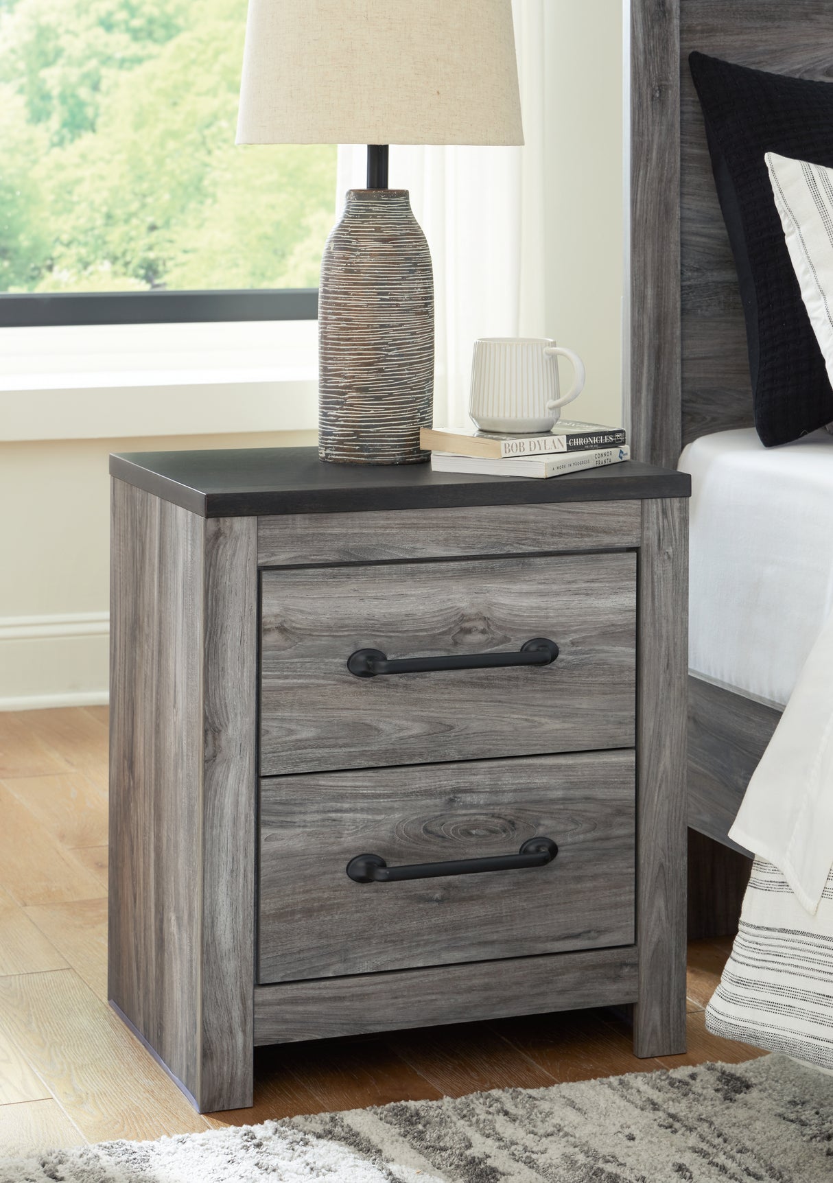 Bronyan King Panel Bed with Mirrored Dresser, Chest and 2 Nightstands in Dark Gray from Ashley Furniture - Luna Furniture