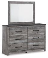 Bronyan King Panel Bed with Mirrored Dresser and Chest in Dark Gray from Ashley - Luna Furniture
