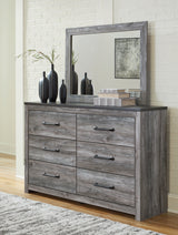 Bronyan King Panel Bed with Mirrored Dresser and Chest in Dark Gray from Ashley - Luna Furniture