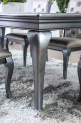 Amina Gray dining table leg, sculpted gray finish and curved profile, close-up detail