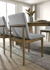 St Gallen dining chair, light gray upholstered seat and back, wood frame, three-quarter view
