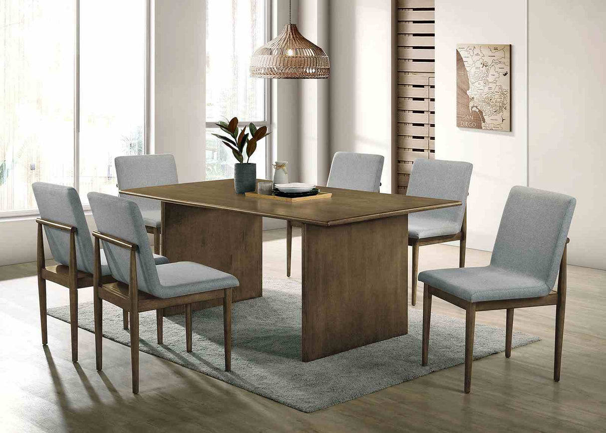 St Gallen dining table set, natural wood table and light gray chairs, front lifestyle view
