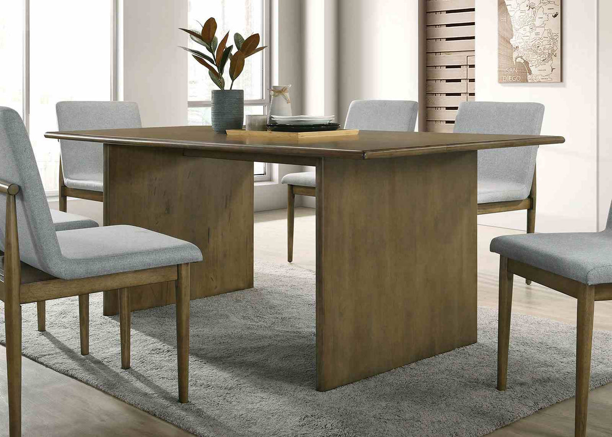St Gallen dining table, natural wood finish, rectangular top and pedestal base, lifestyle angle