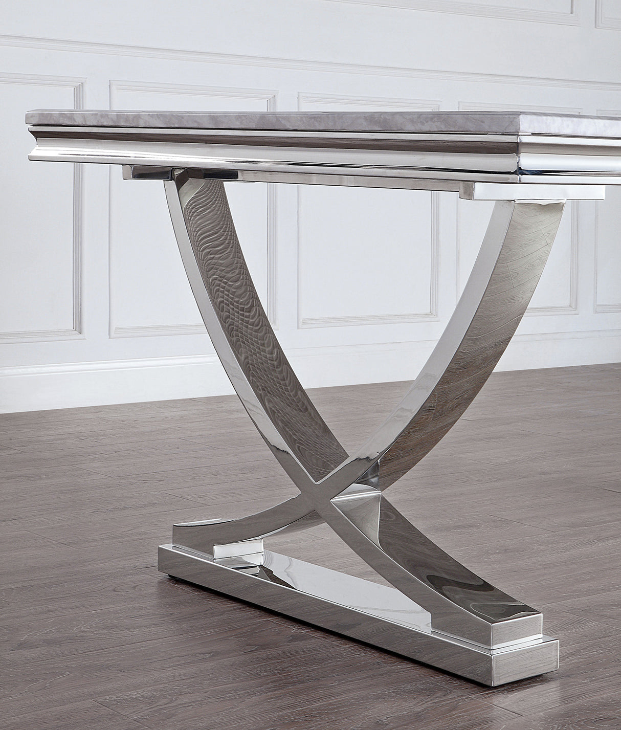 Wadenstil Chrome dining table, chrome V-pedestal base, side detail view