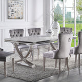 Wadenstil Chrome dining table, marbled stone top and chrome V-pedestal, three-quarter view