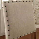 Sania Oak bar chair, ivory linen-like upholstered back with nailhead trim, close-up
