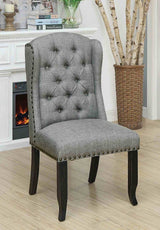 Sania Antique side chair, blue-gray tufted wingback upholstery, antique black legs, three-quarter view