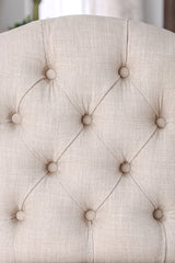 Sania Antique side chair, close-up of beige button-tufted upholstery