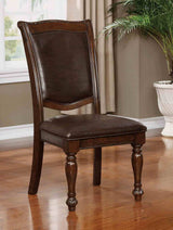 Alpena Brown dining chair, upholstered back and seat, carved wood legs, front view