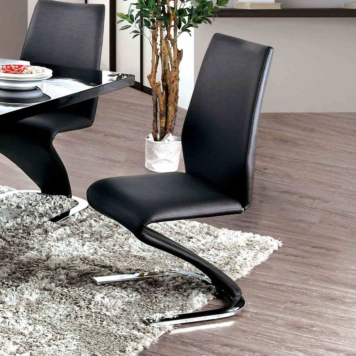 Midvale Black/Chrome side chair, black leatherette upholstery, chrome Z-shaped base, three-quarter view