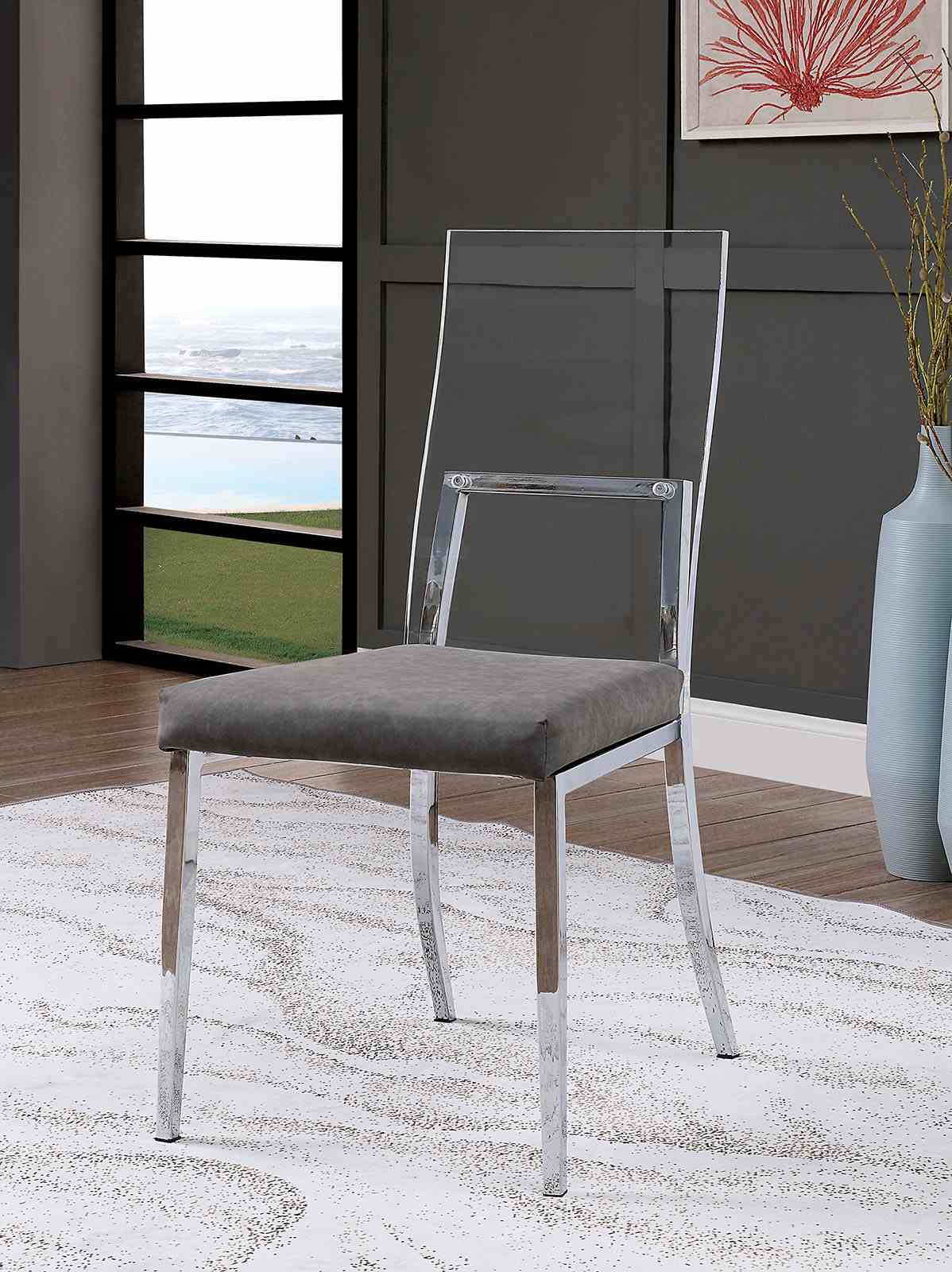 Casper Chrome dining chair, clear acrylic back with gray upholstered seat, front view