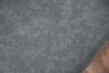 Casper Chrome dining chair, gray upholstered seat close-up, chrome corner detail