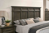 Houston Gray Queen Bed, tall paneled headboard and layered bedding, close front view